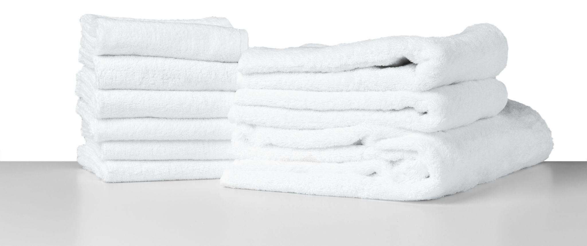 Stacks of clean folded white towels