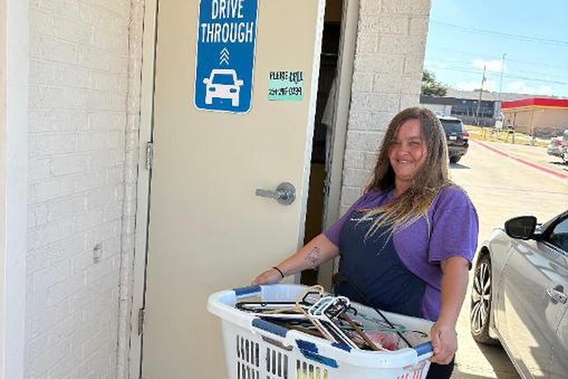 Customer using the drive-thru door at WaveMAX Laundry Temple, TX